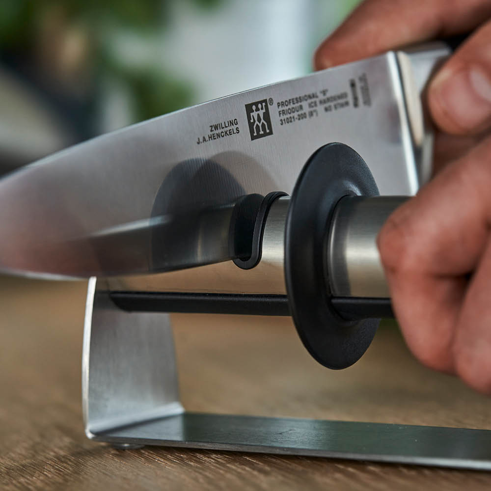 https://www.zwilling.com/on/demandware.static/-/Sites-zwilling-ca-Library/default/dw708857c5/images/product-content/masonry-content/zwilling/cutlery/knife-sharpener/32601-000-0_Product_In_Use_OS_750x750_3.jpg